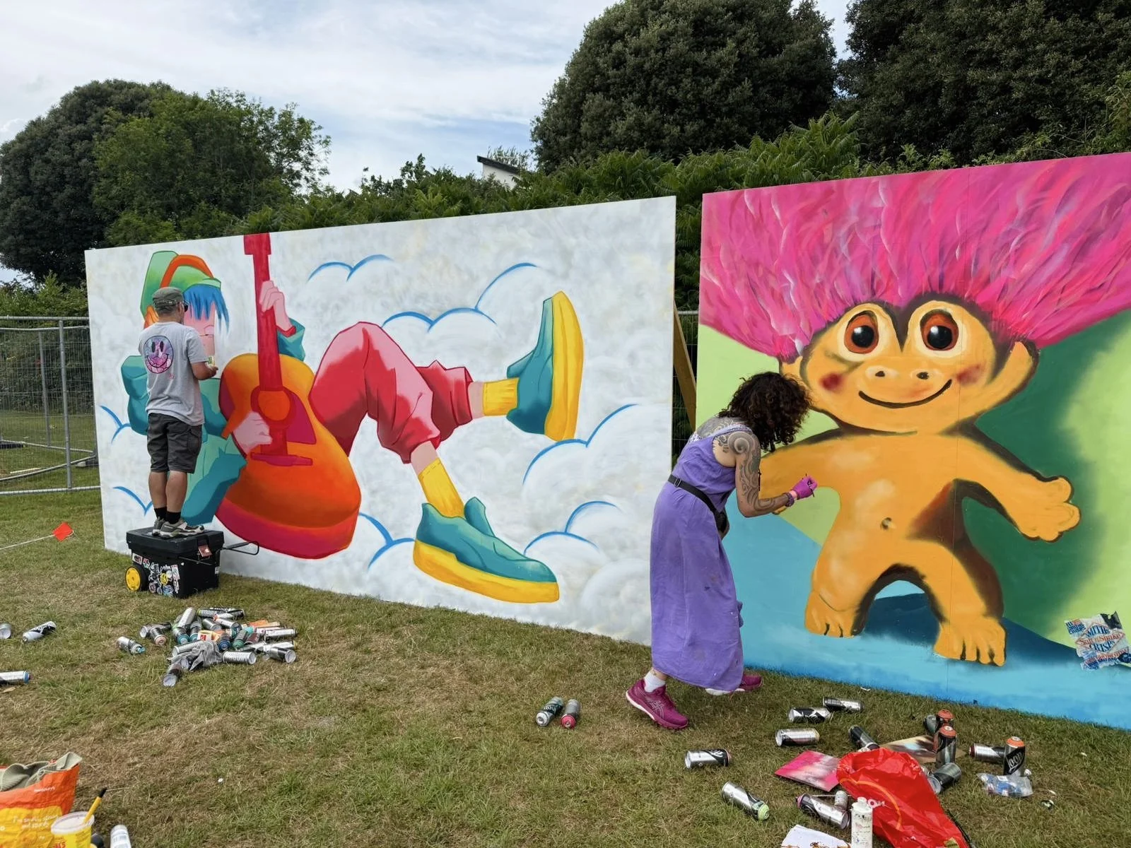 street artists working at a festival