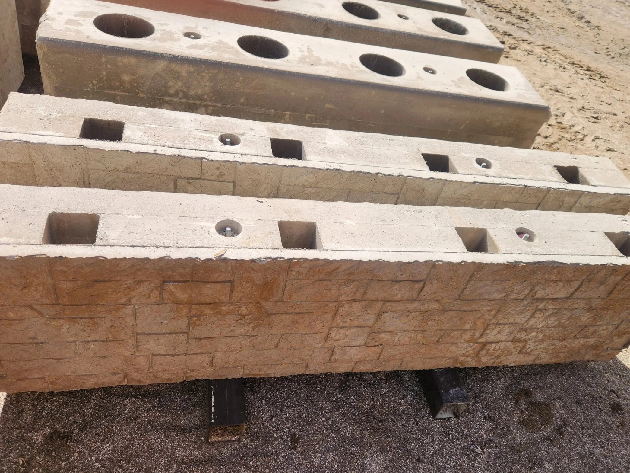 2m x 500mm x 250mm stone-faced wall blocks
