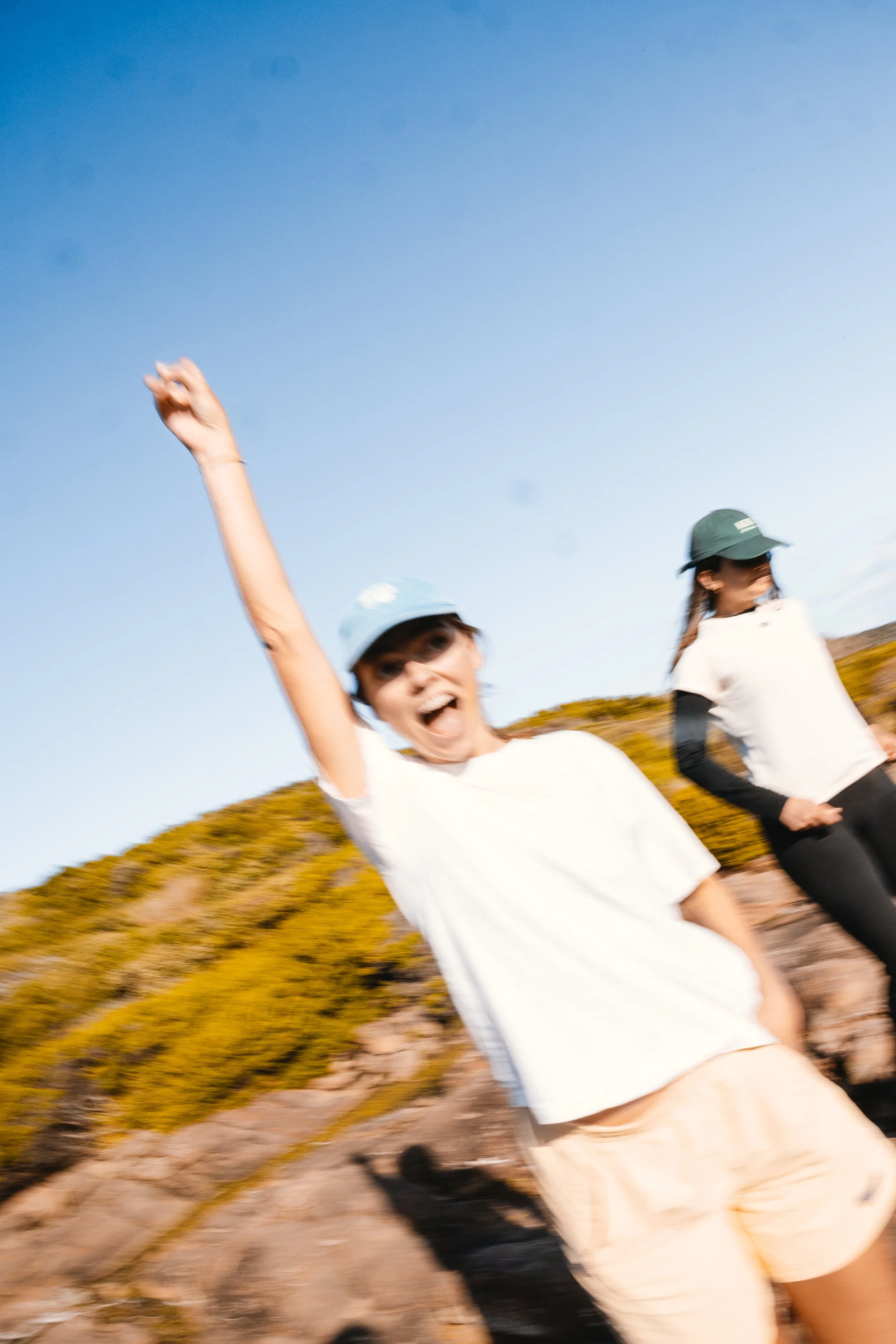Girl having fun hiking women adventures women outside girls on the trail overnight hiking Tasmania. Wineglass Bay and Walls of Jerusalem and Freycinet Circuit