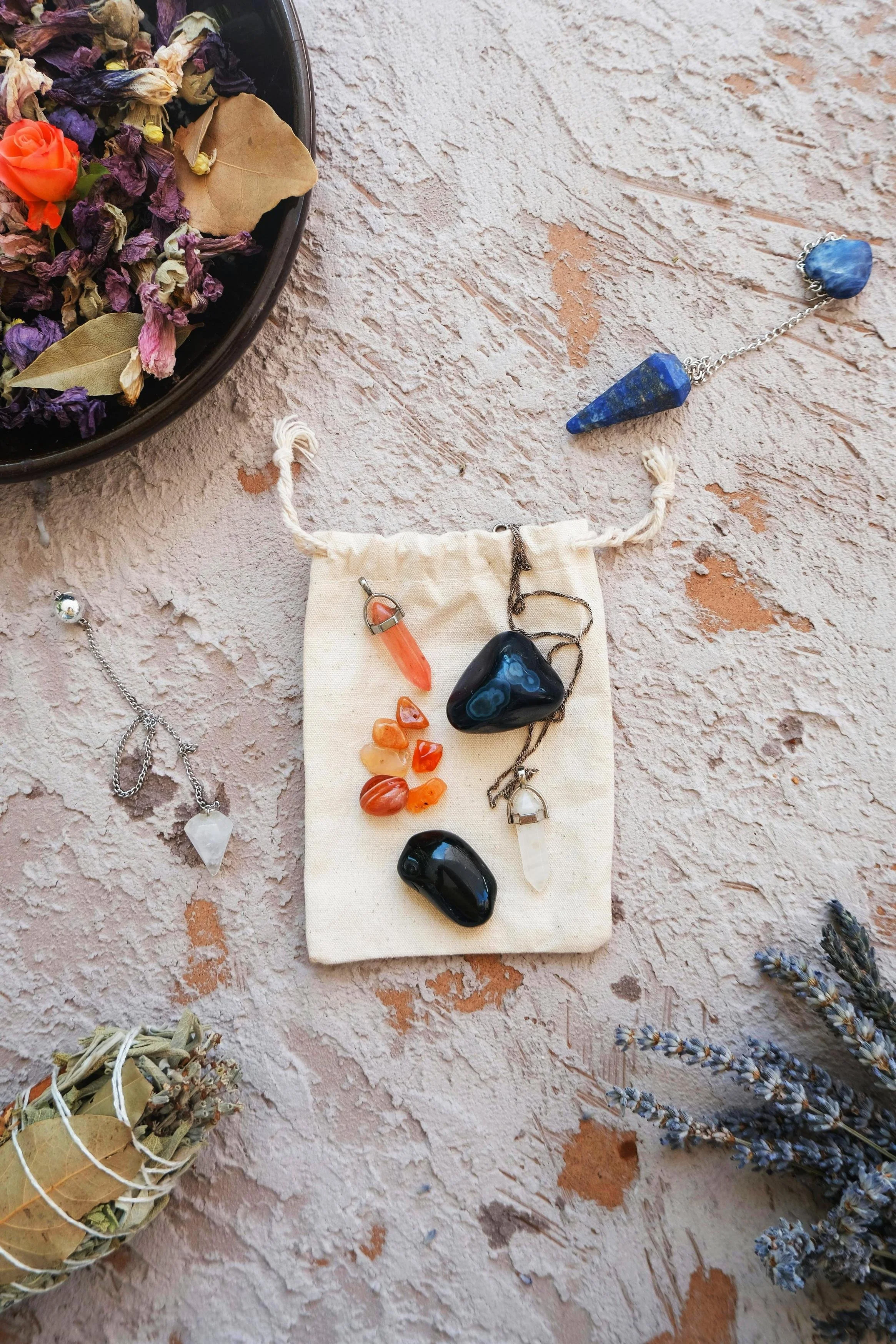 flat-surface image of several crystal pendulums