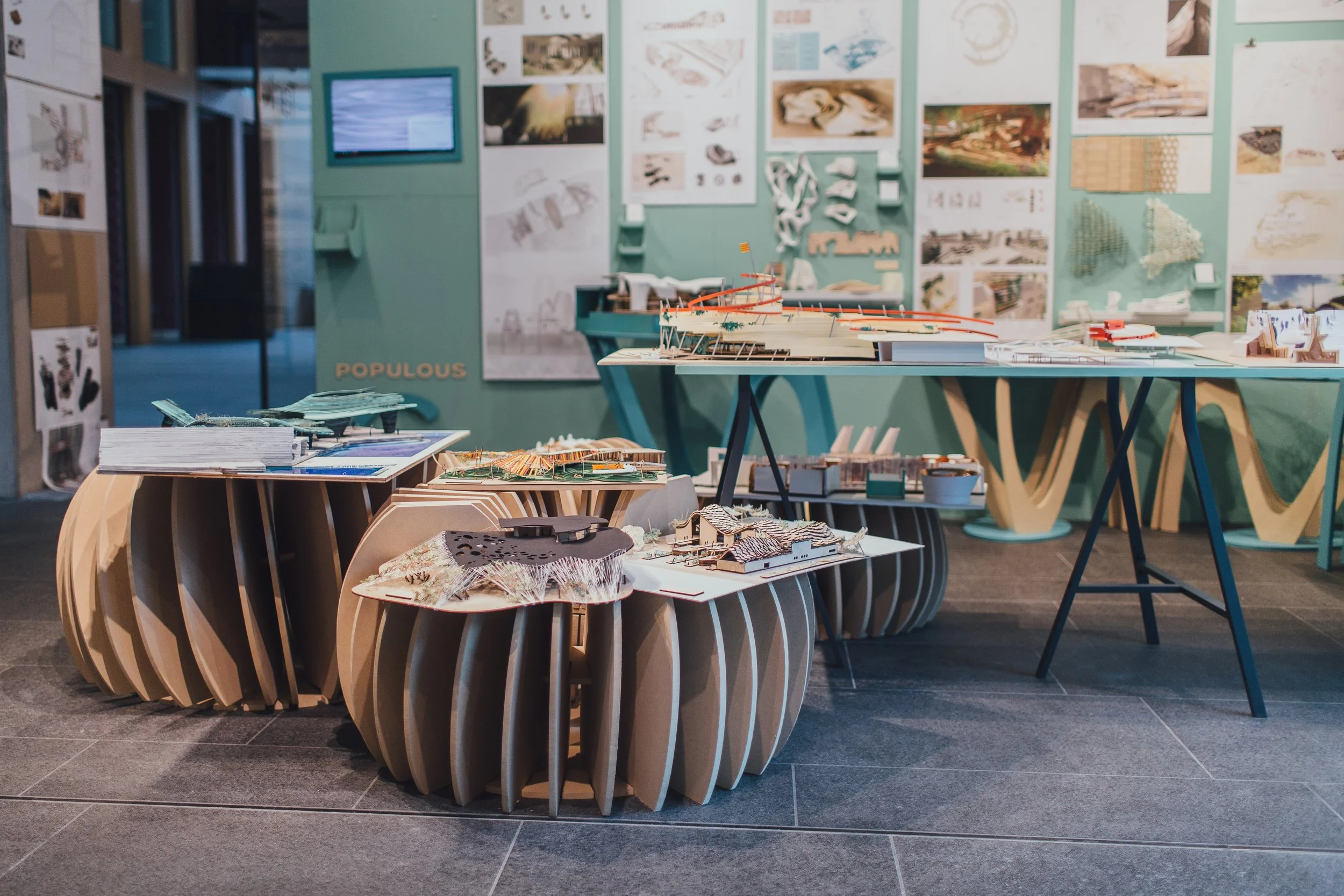 Architectural models (and drawings) on a wall at Oxford Brookes studios
