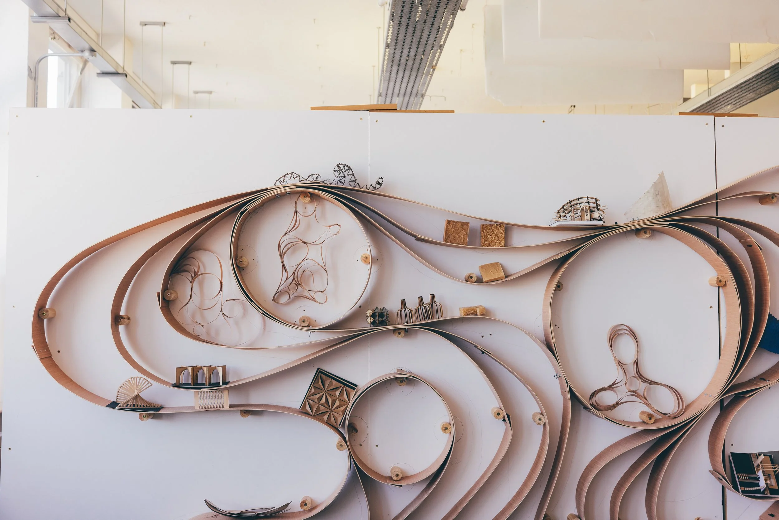Architectural models on a wall at Oxford Brookes studios