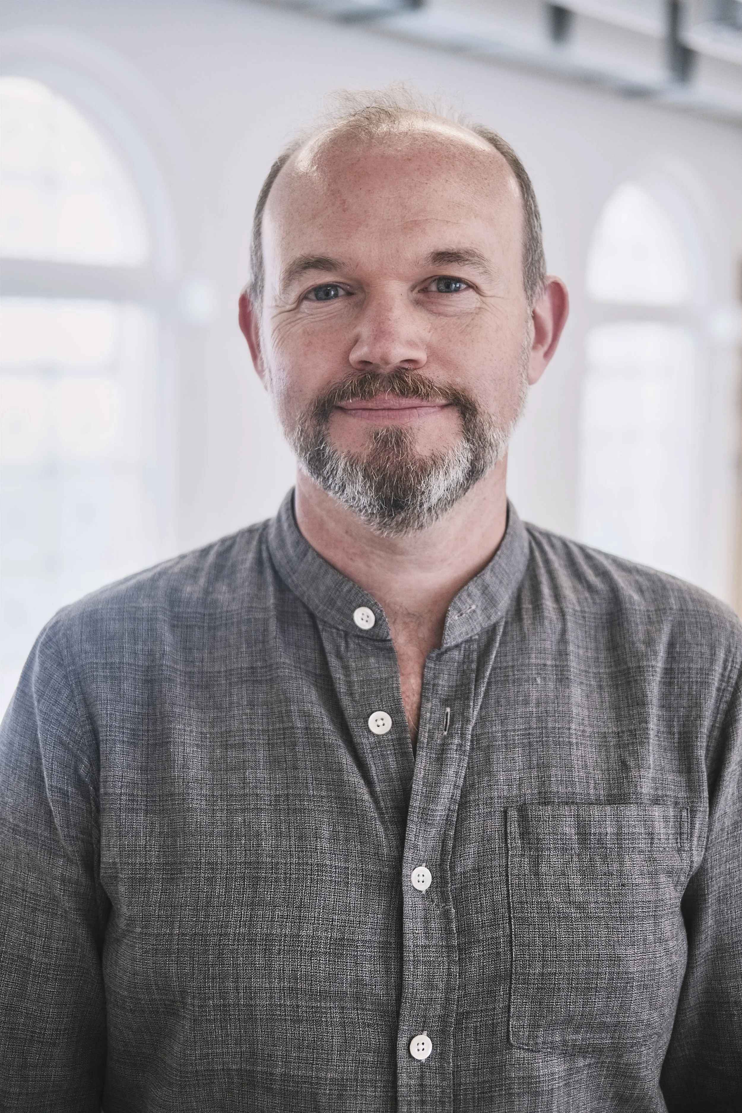 Headshot of Dr Christopher Whitman