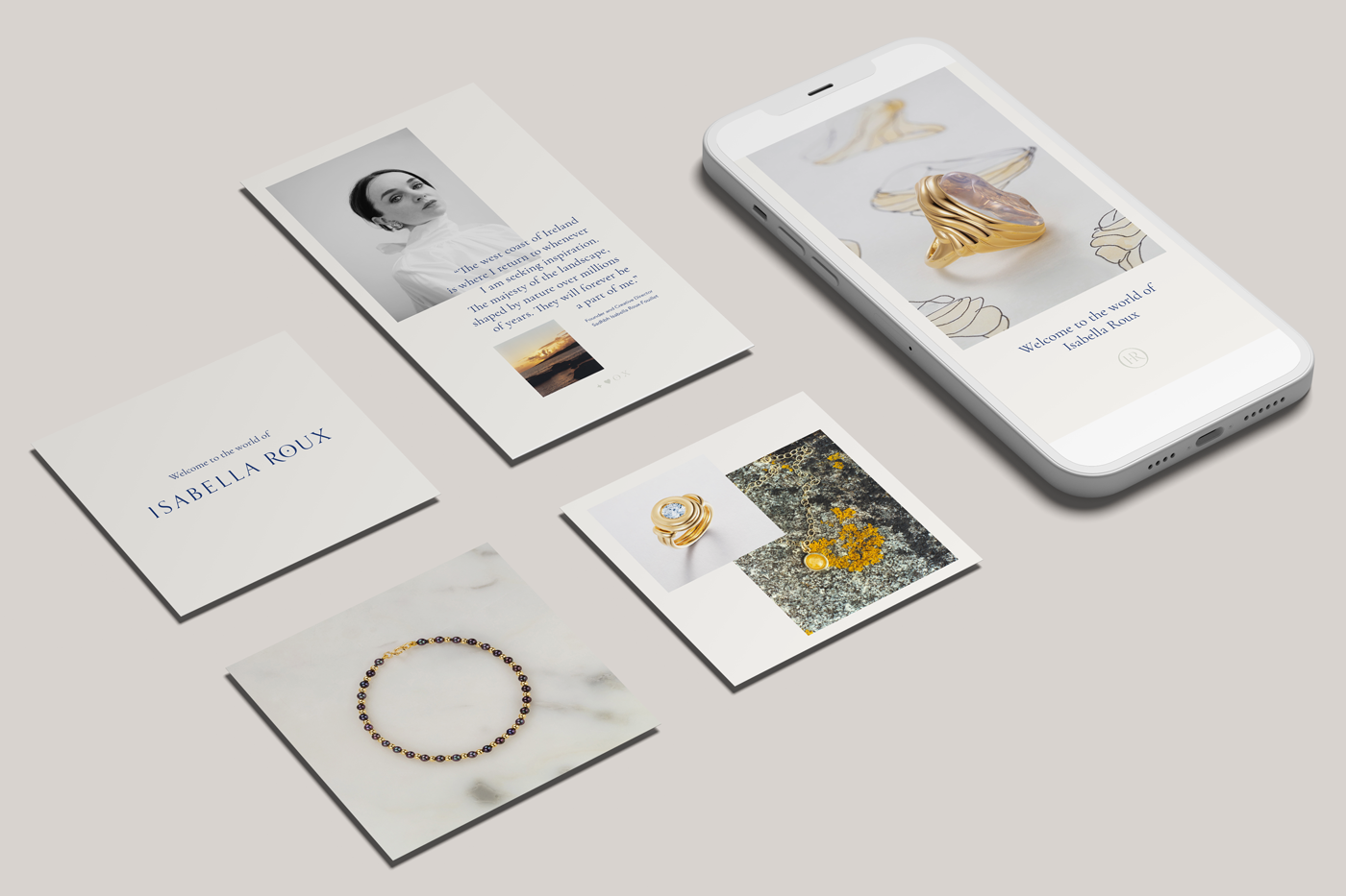 A collection of jewelry and branding materials for Isabella Roux, including a smartphone displaying jewelry photos, postcards with jewelry images, and a card with the brand name 'Welcome to the world of Isabella Roux'.