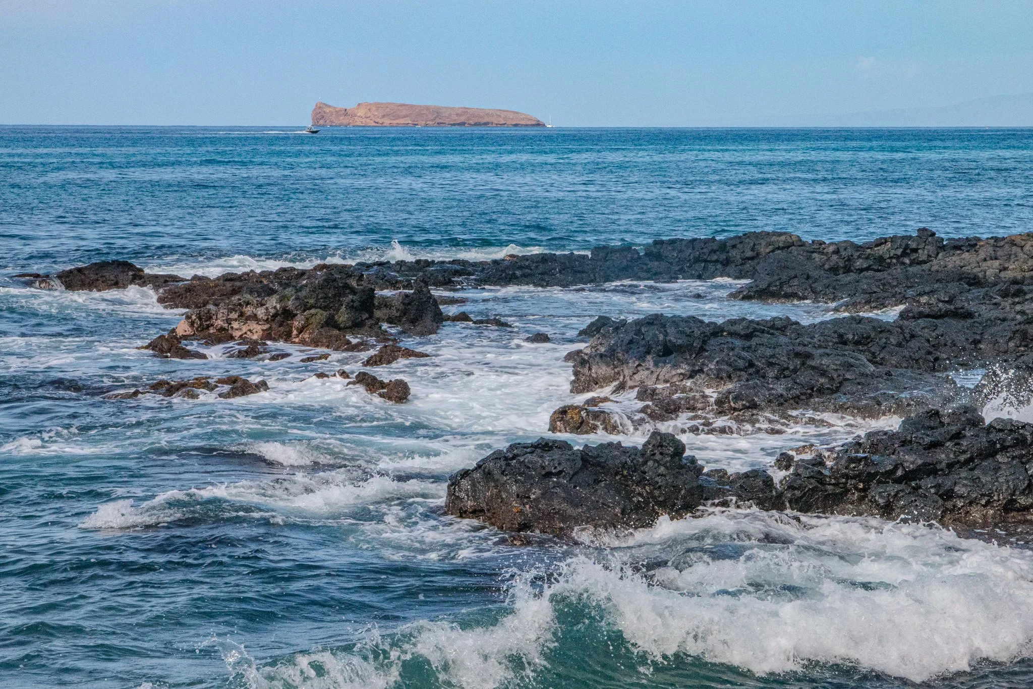 Maui lava coast metal print with ocean waves and offshore crater view