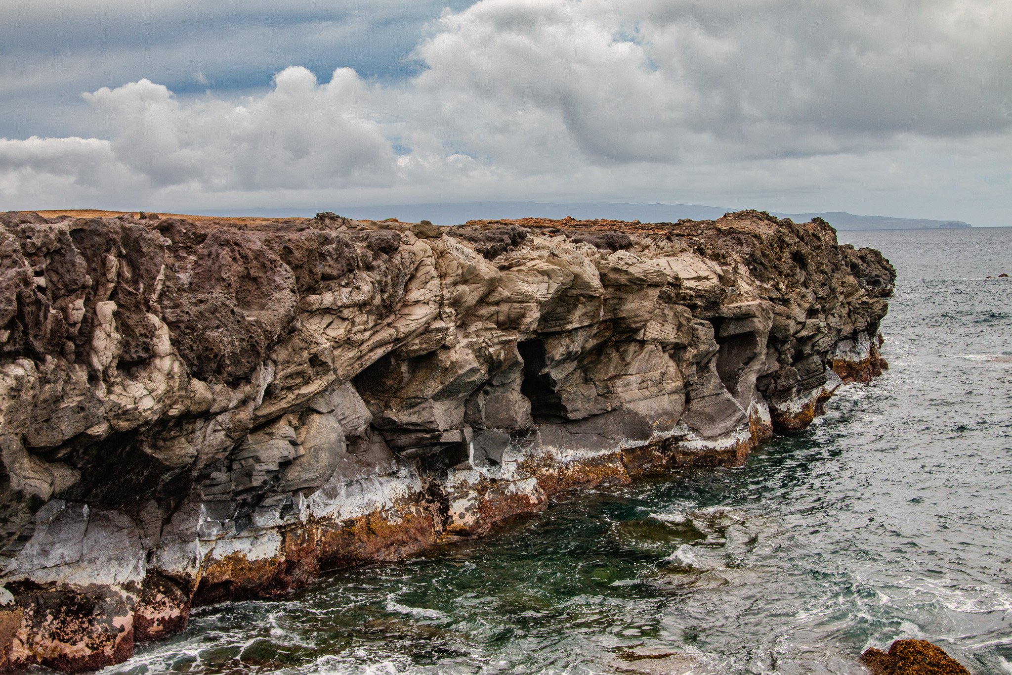 Eroded lava cliffs at the Dragon’s Teeth formation along the Kapalua coastline on Maui’s northwest shore