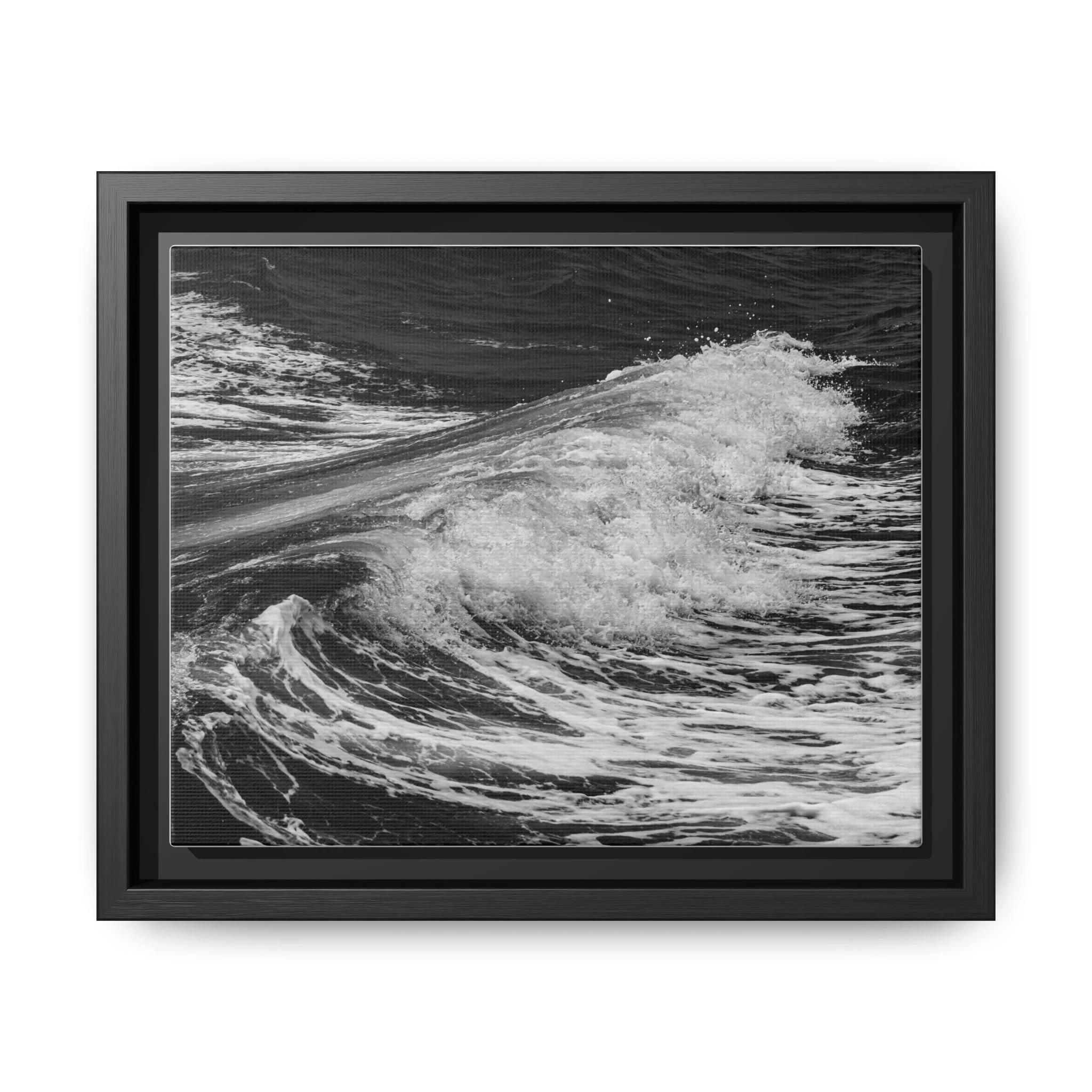 Framed monochrome canvas print of a breaking ocean wave photographed in Maui, Hawaii