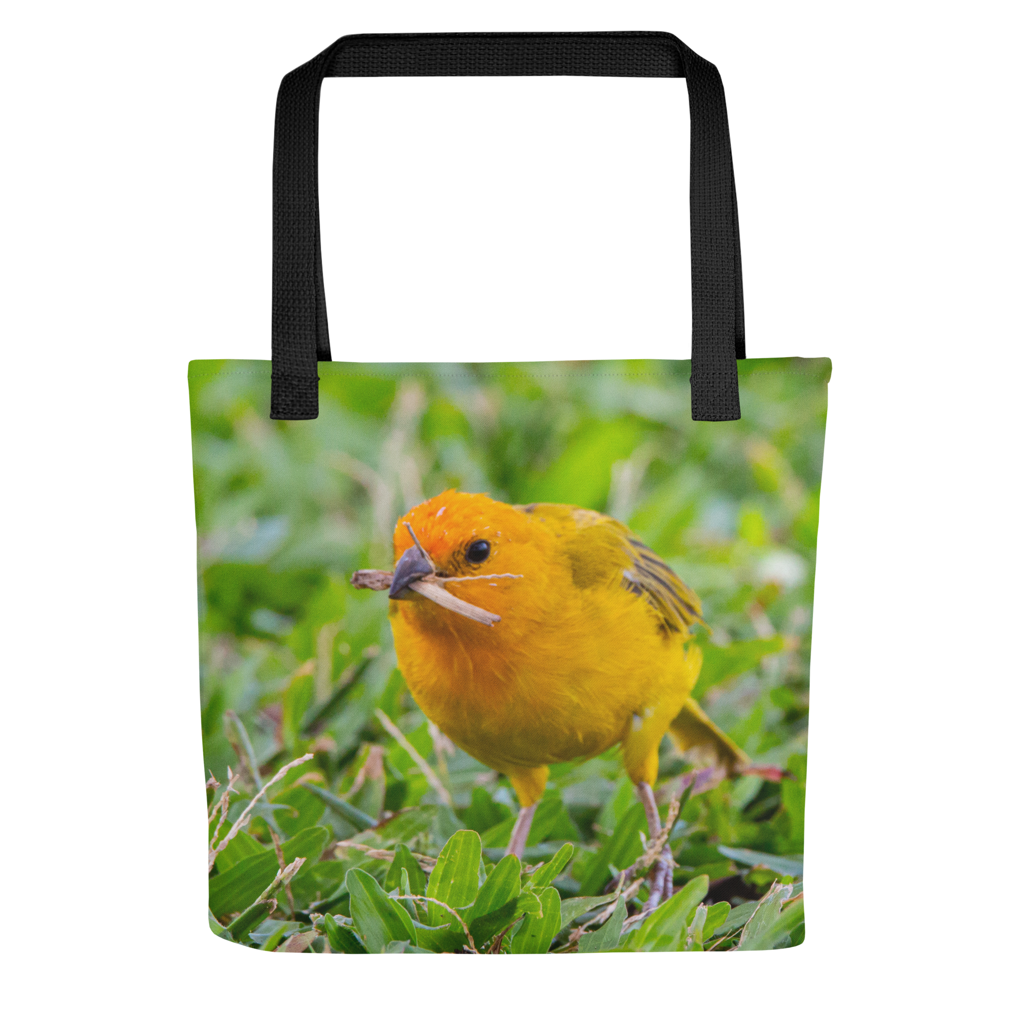 A vibrant Hawaiian tote bag featuring a Yellow Saffron Finch resting on a green lawn. Lightweight, durable, and perfect for everyday use or island adventures.