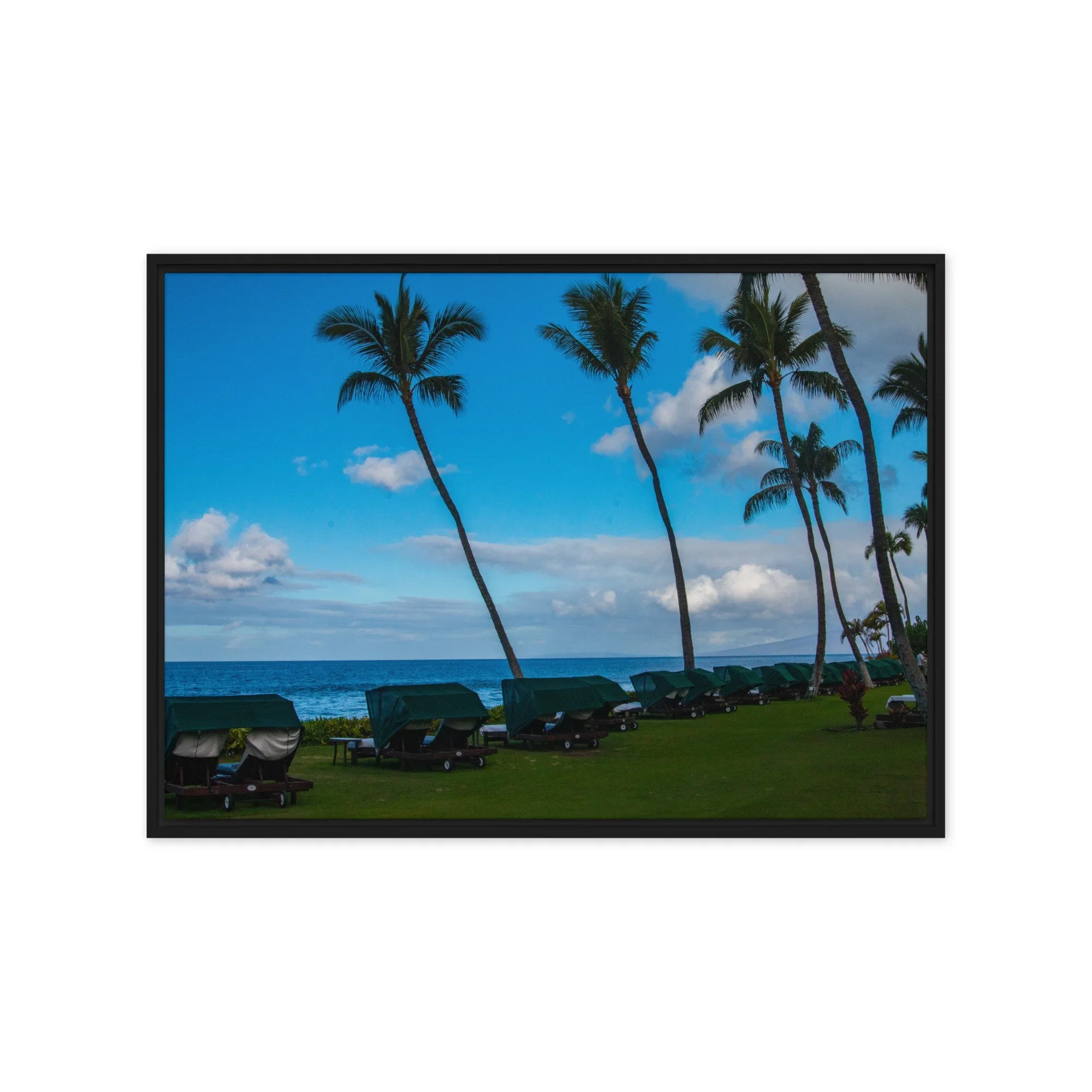 Kāʻanapali Maui wall art featuring palm trees and beachfront lounge chairs overlooking the ocean, ideal for tropical coastal home decor