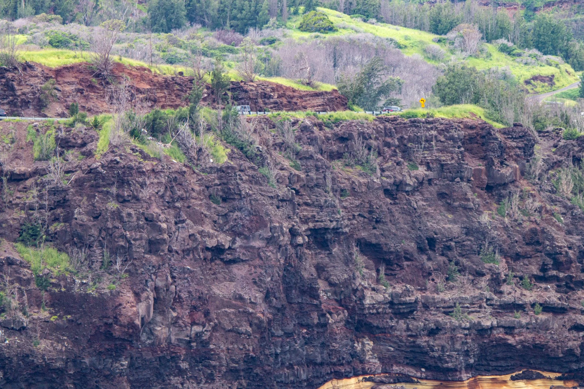 Layered volcanic cliffs along the coastline near Nakalele Point on Maui’s rugged northwest shore