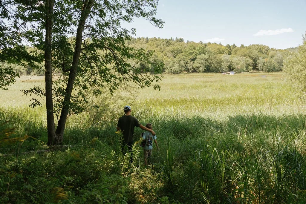 Peaceful outdoor setting surrounded by nature and walking trails.