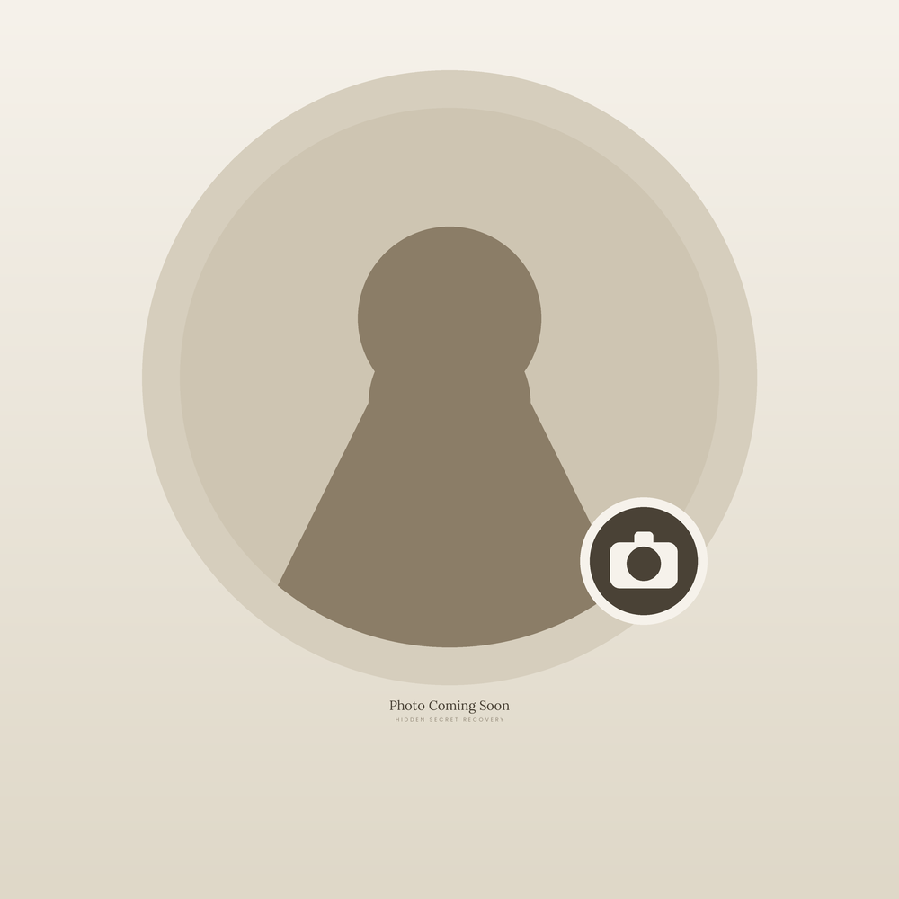 Placeholder image with a keyhole icon and the text 'Photo Coming Soon' indicating a pending photo, with a neutral beige background.