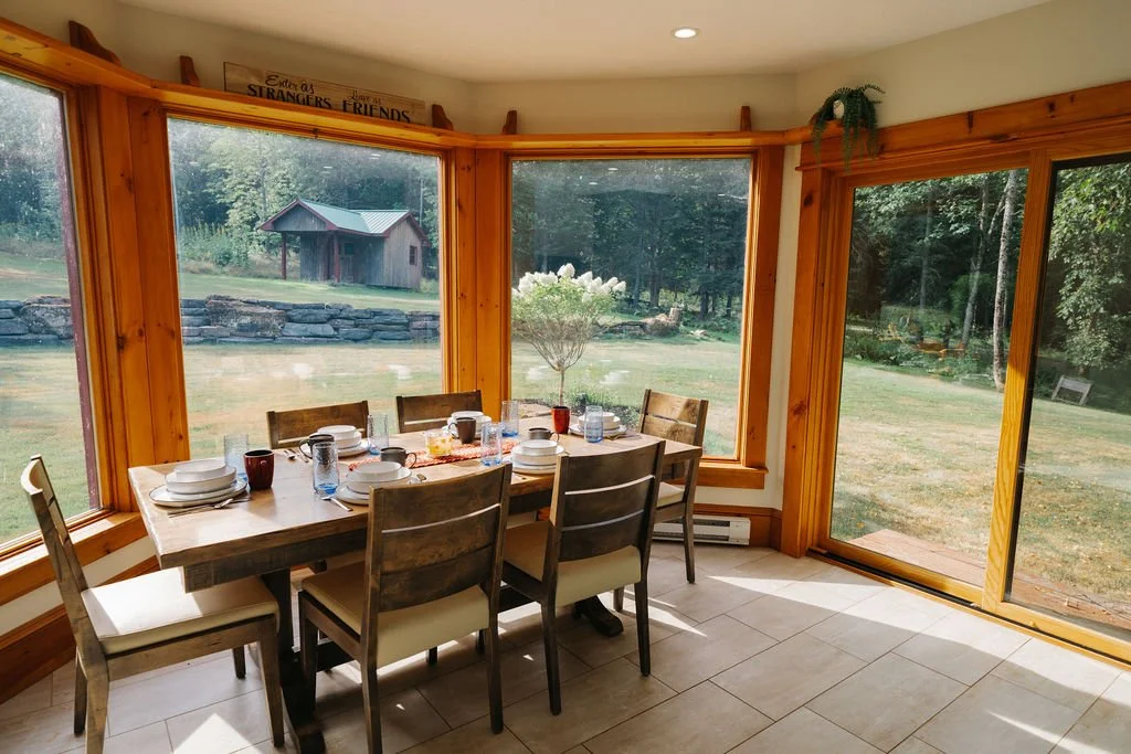 Dining area with panoramic views of the property.