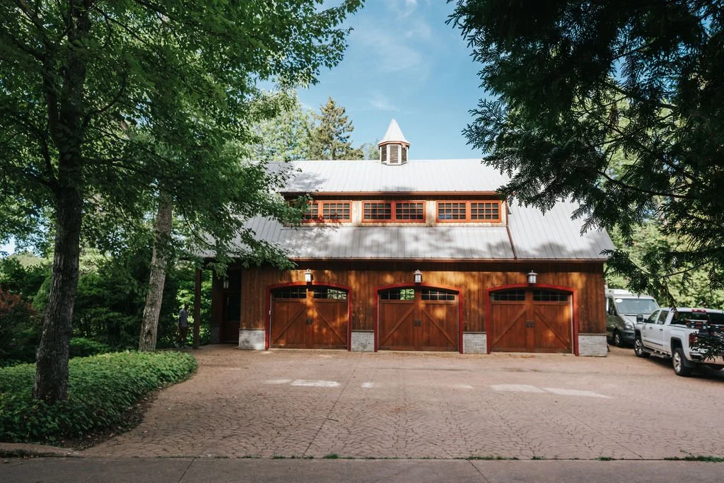 Detached garage with a games room and movie theatre upstairs, and the gym downstairs. 
