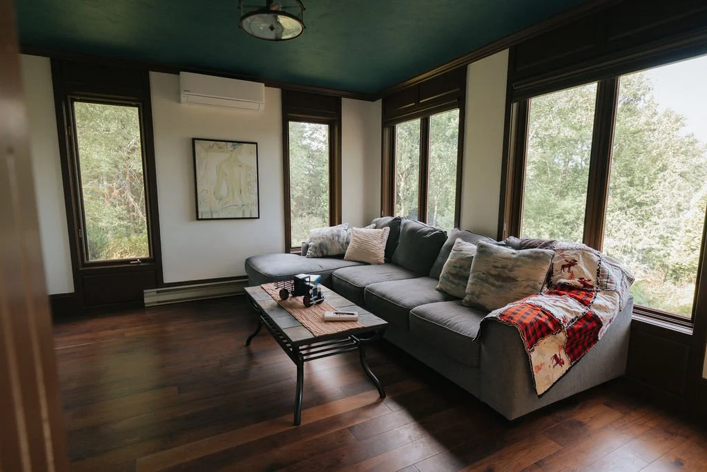 Bright shared living area designed for rest and conversation.