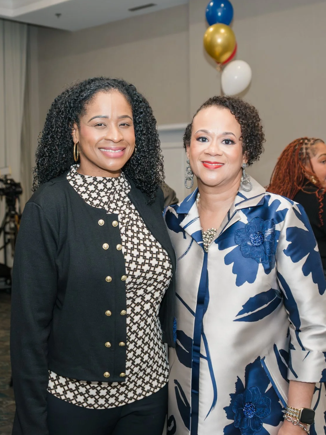 Amanda standing with Alicia Johnson