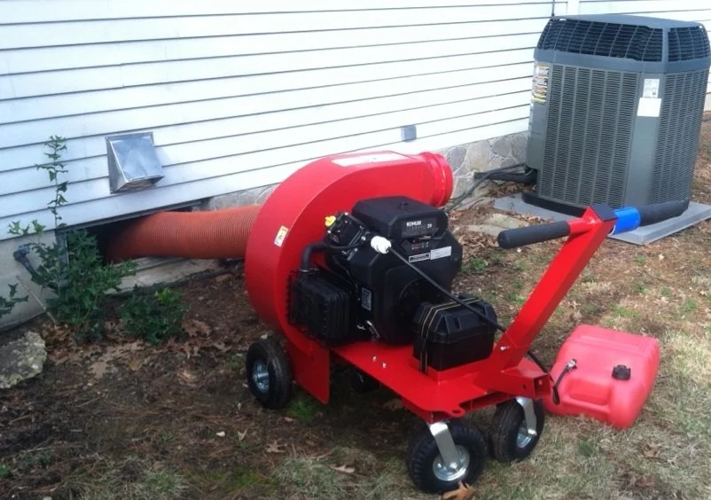 Air Duct Pros 20 horsepower gas-powered negative-pressure vacuum equipment