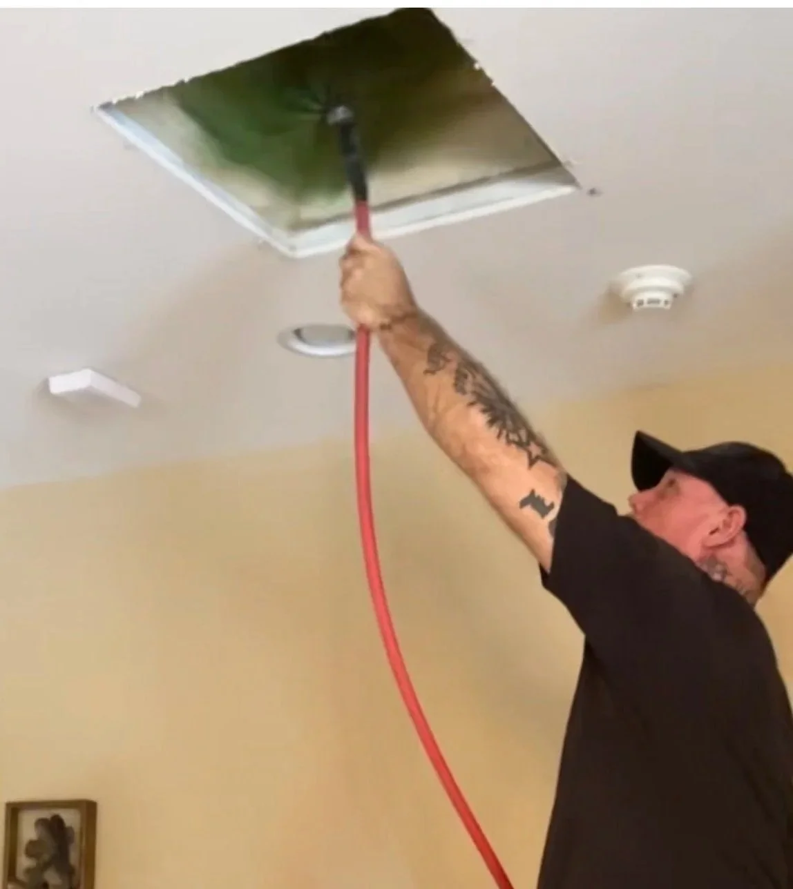 Air Duct Pros technician professionally cleaning residential ductwork in Maryland
