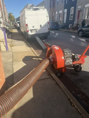 Air Duct Pros, Inc. professional gas-powered negative-air equipment set up for residential air duct cleaning