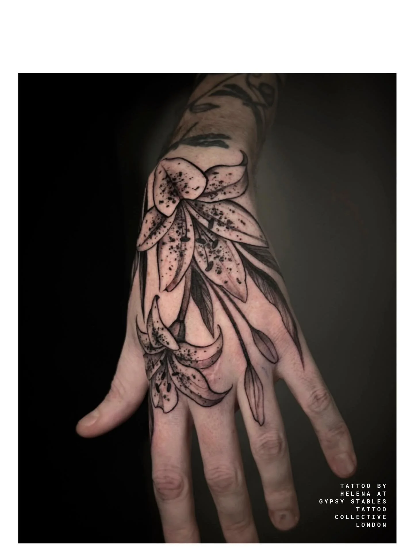 Lillies hand tattoo by @helenavelazquez | To book in with Helena at our central London tattoo studio contact her directly or book via our website