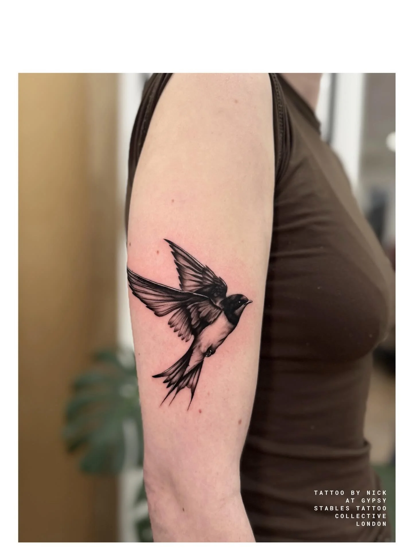 Realistic, detailed swallow bird in motion tattoo by Nick @nicktattoo.g done at our central London tattoo studio | April 2026 | To book in for a tattoo with Nick contact him directly or book through our website