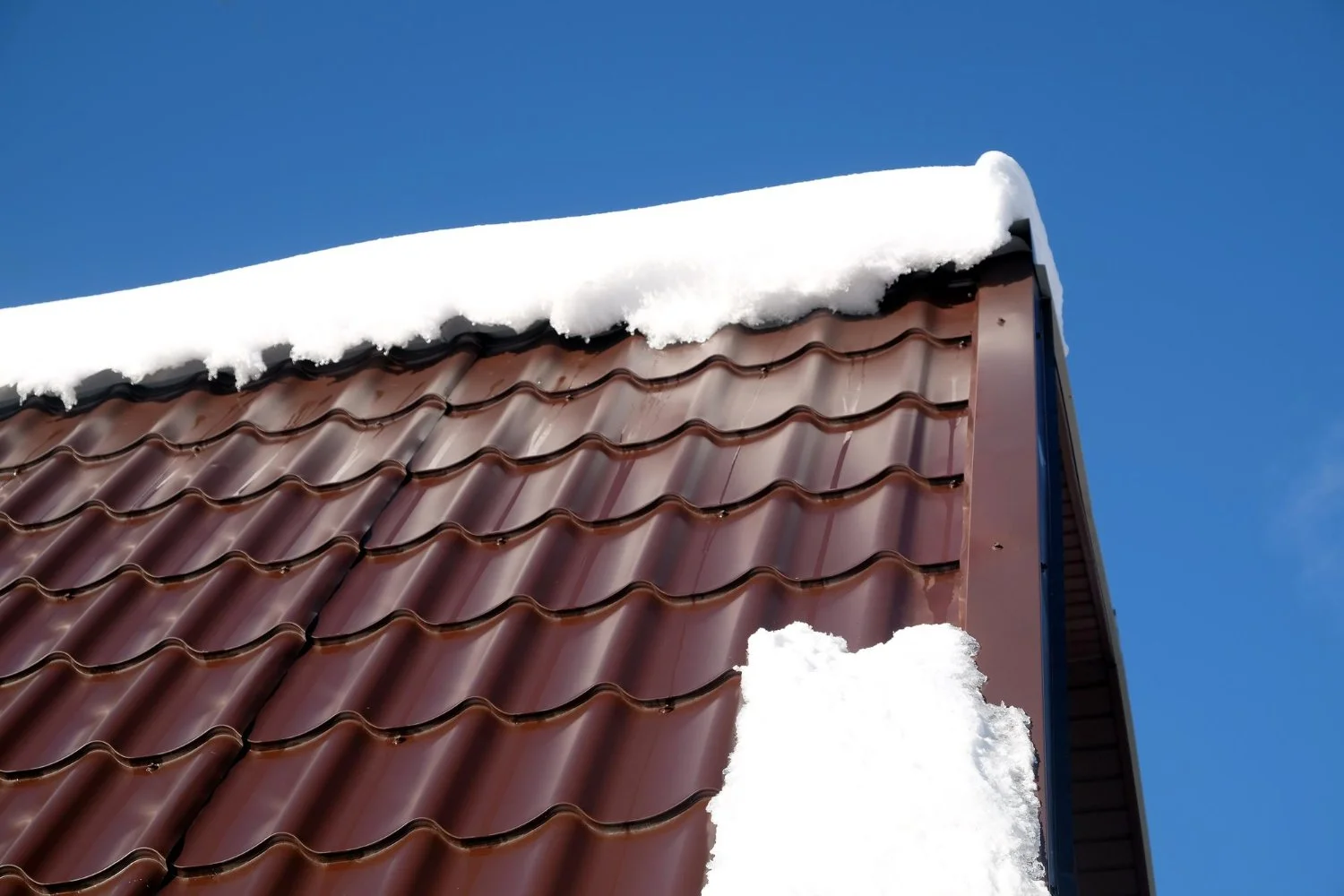 How to Choose Between Repair or Replacement After Roof Ice Damage