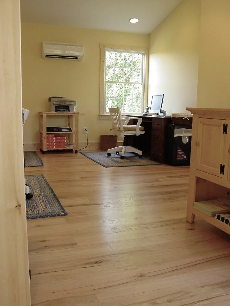 The floors and trim were coated with a waterborne polyurethane keeping them clear and vibrant!