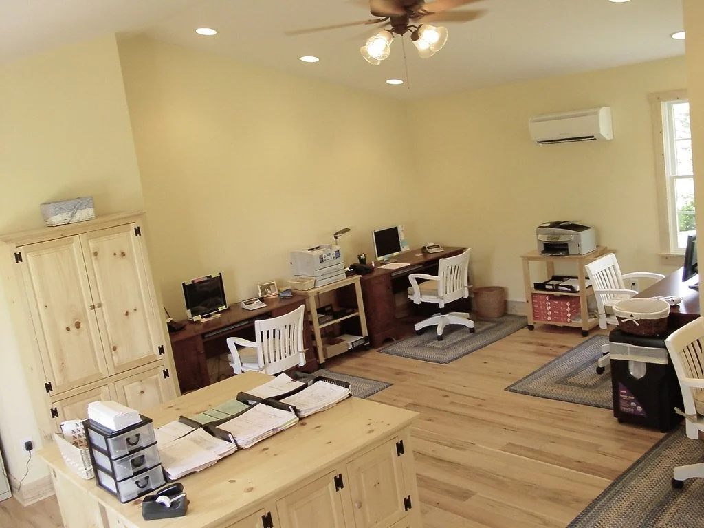 Cathedral ceiling and plenty of light. Spacious for a small home office!