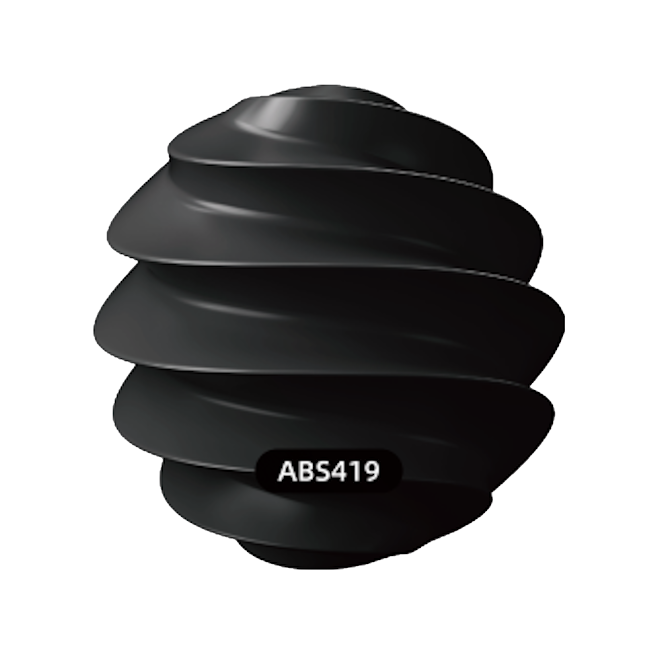 A black, layered, spiral-shaped object with the label ABS419.
