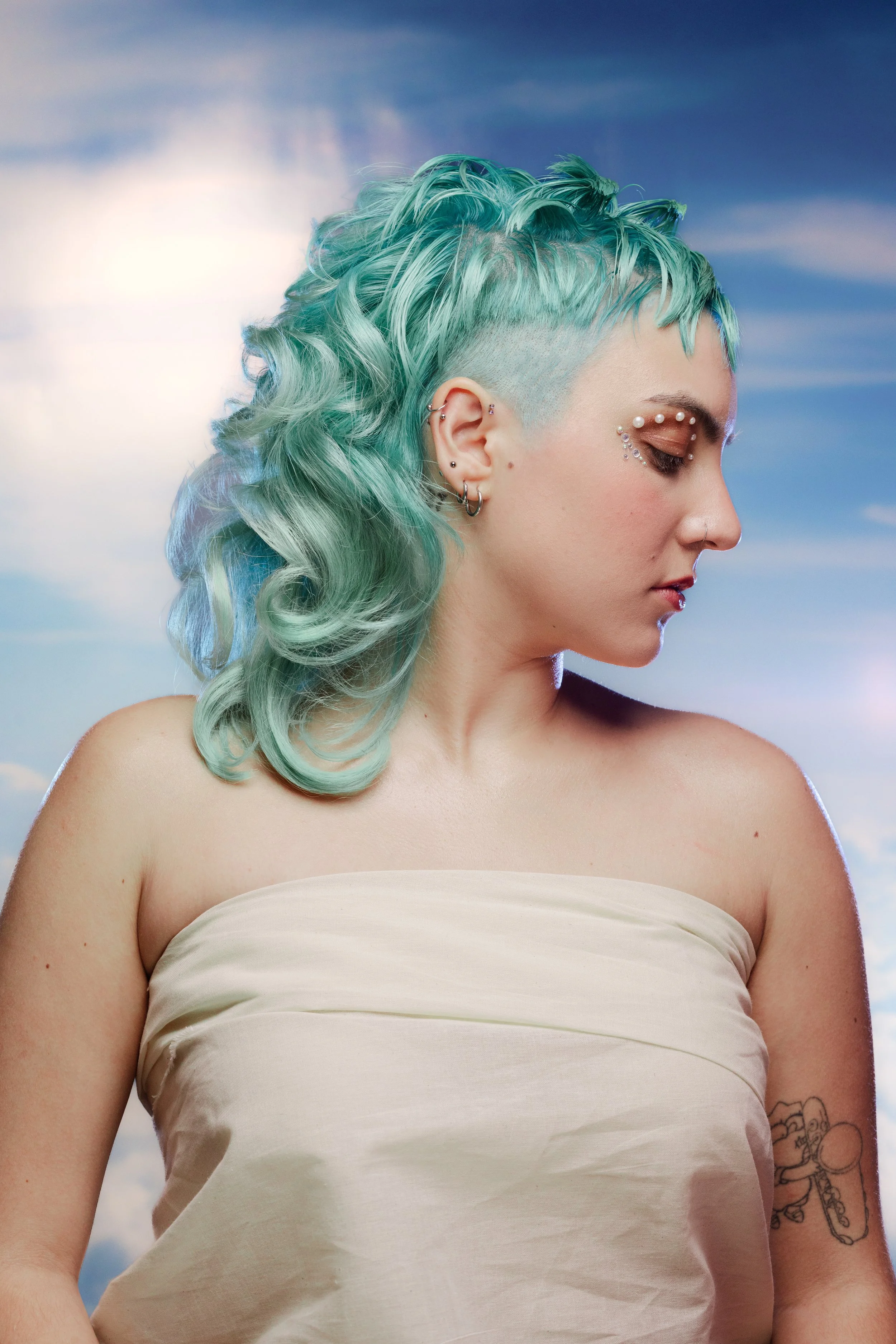 Custom turquoise fantasy color and edgy mullet by Russel Thompson, Union Beauty salon, Park Slope, Brooklyn.