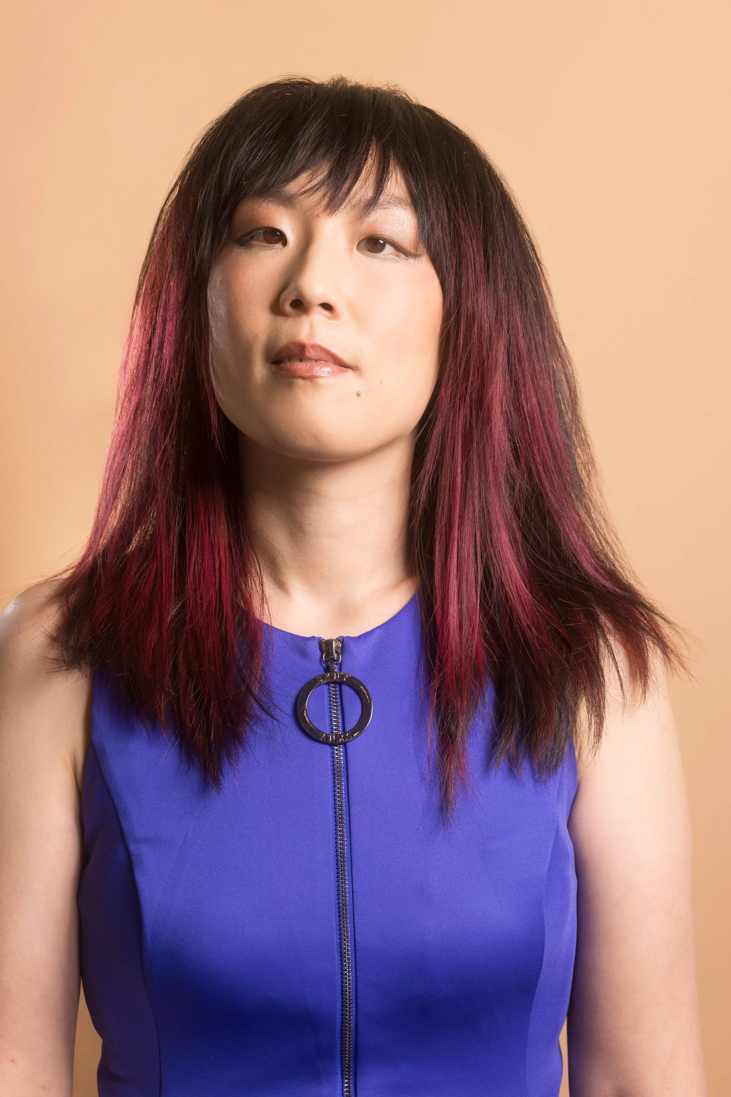 hair salon near prospect park features cherry cola color and a shag with bottleneck bangs