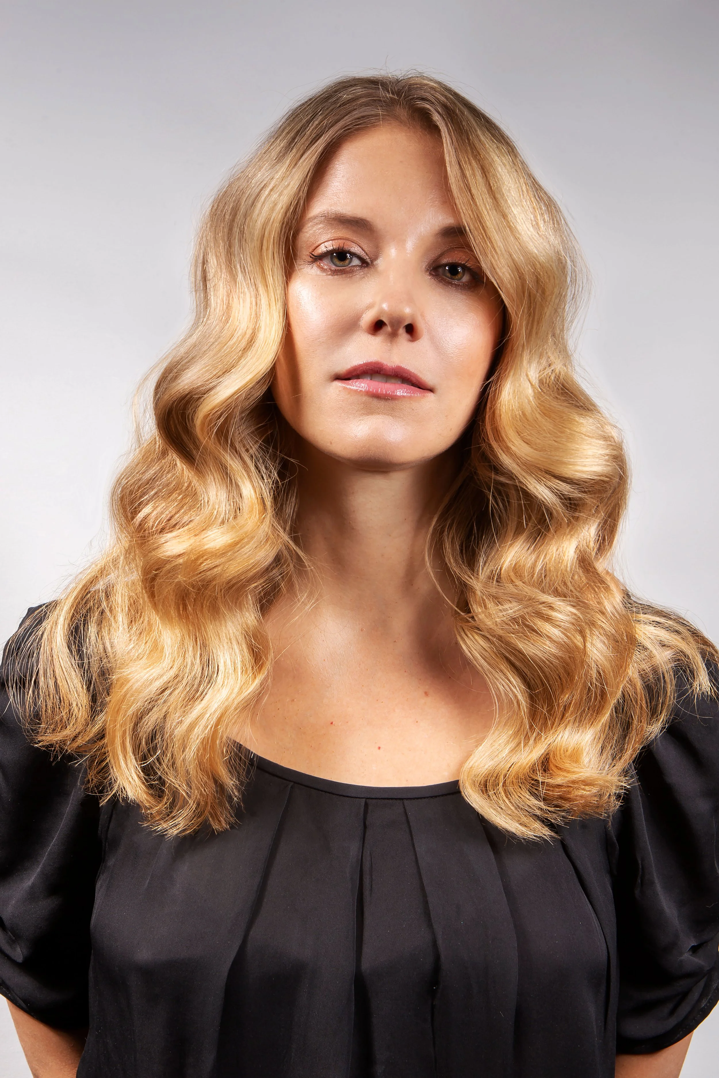 Butter blonde balayage styled in Hollywood waves by Russel Thompson, Union Beauty salon, Park Slope, Brooklyn.