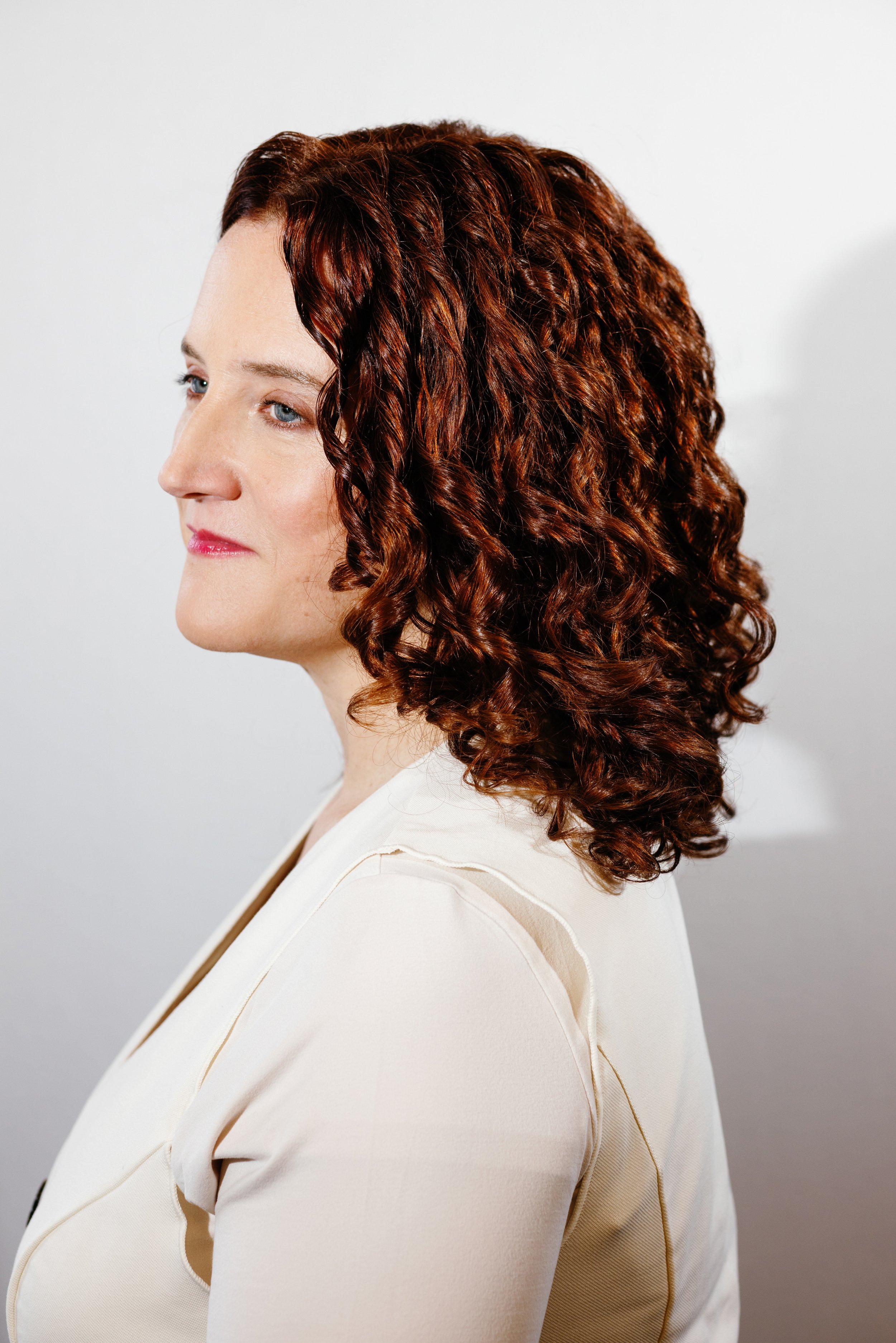 Rich red single process and curly cut by Betina Levine-Rivas, Union Beauty salon, Park Slope, Brooklyn.