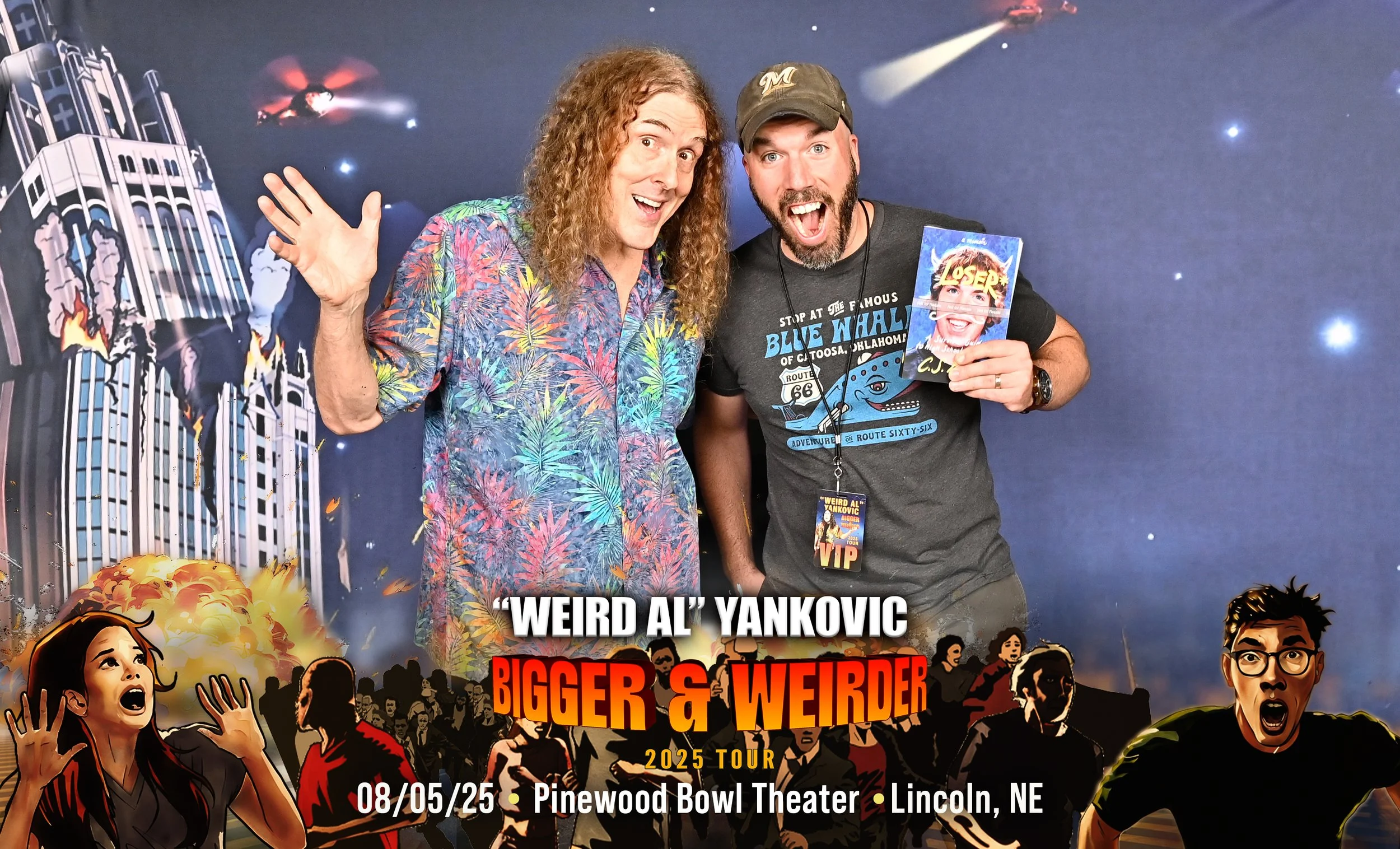 Two men at a comedy show, one with long curly hair wearing a colorful tropical shirt, and the other with a beard, cap, and graphic T-shirt, holding a comedy DVD. They are in front of a space-themed backdrop with animated explosions, buildings, and comic-style shouting characters. The poster displays the names 'Weird Al' Yankovic and 'Bigger & Weirder,' date August 5th, 2025, at Pinewood Bowl Theater in Lincoln, NE.