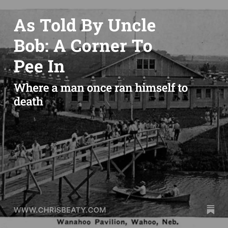 Historical black and white photograph of a crowd gathered on a wooden bridge over water in front of a large building called the Wanahoo Pavilion in Wahoo, Nebraska, with two people in a boat and the caption about Uncle Bob's story.