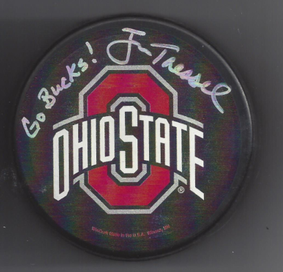 A hockey puck with the Ohio State University logo and a handwritten message 'Go Bucks!'.