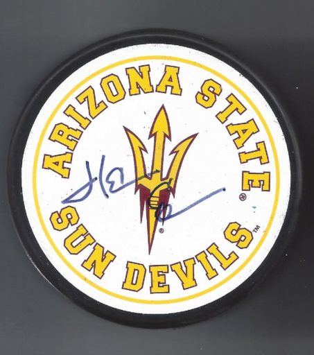 Circular sign with the Arizona State Sun Devils logo and signature.