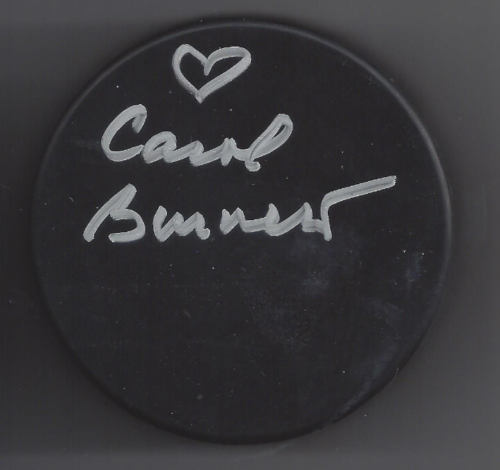A black circular surface with white handwritten text that says '♥ Camp Summer'.