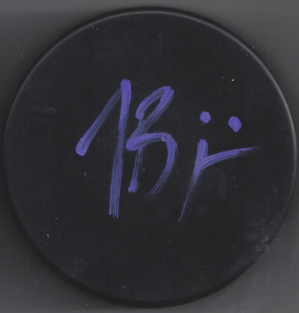 Black surface with purple handwritten number 15 and a colon.