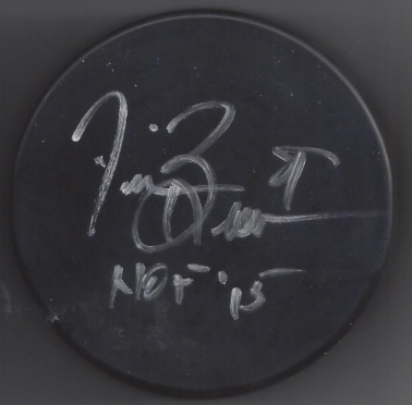A round black chalkboard with handwritten white chalk notes showing the time as 9:22, and additional handwritten notes including the temperature 40° and 15.