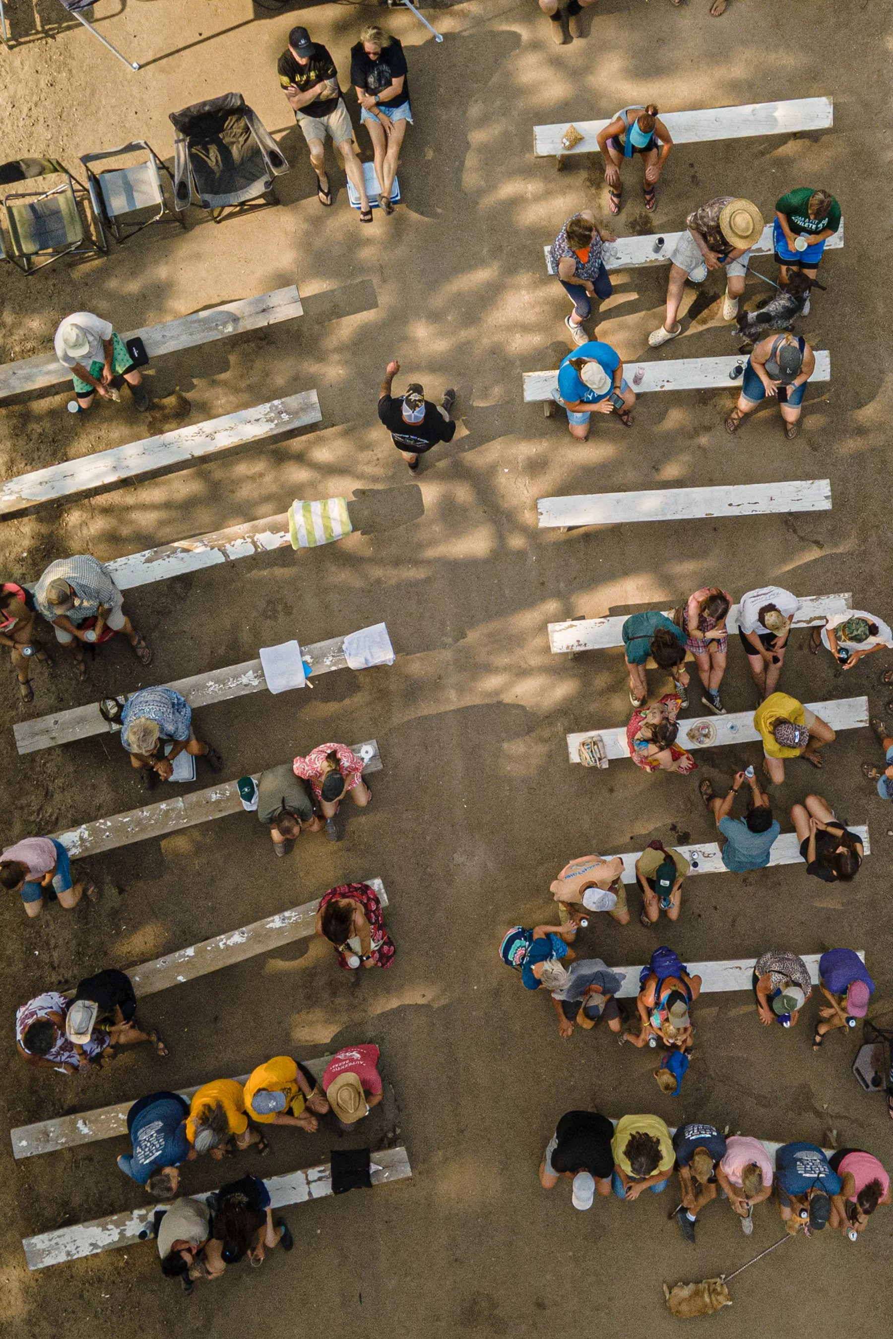 Festival visitors begin seating themselves for the next round of musicians getting ready to preform. 