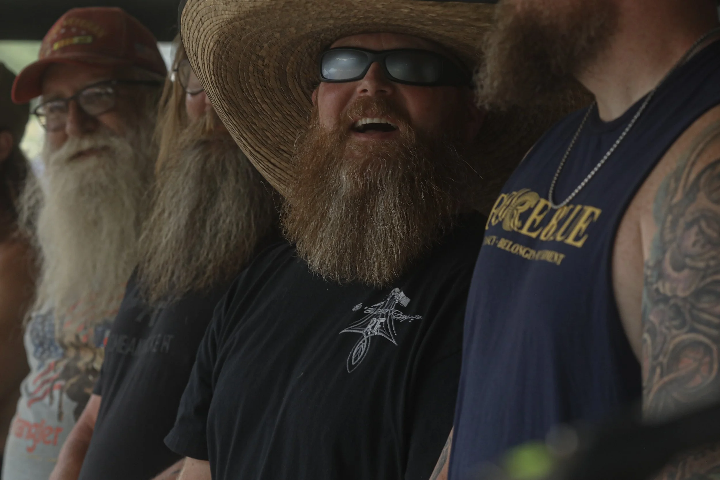 Beard contest contestants lined up on stage to see who would be selected as beard champion.