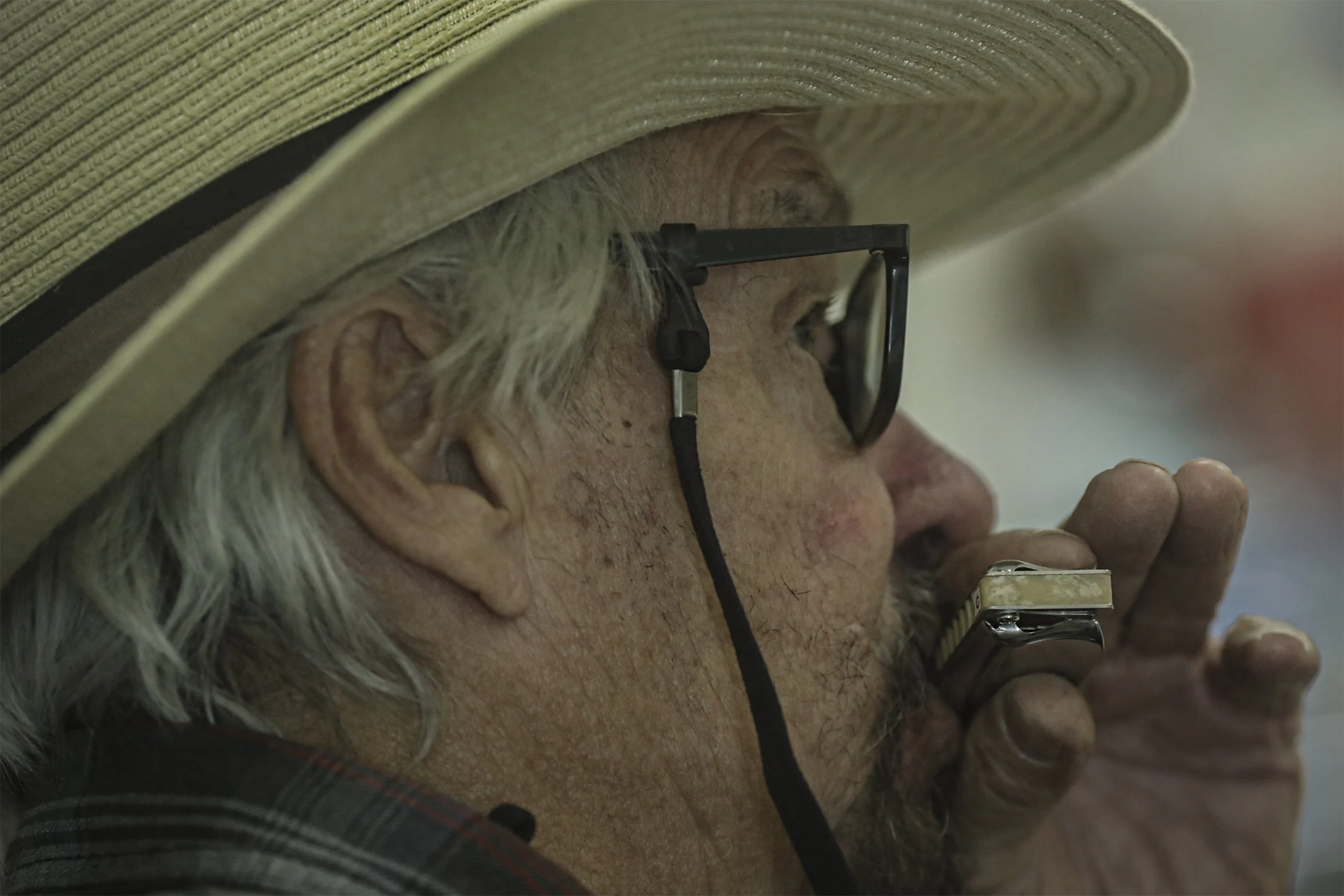 Roy Voeller practices harmonica exercises during the harmonica workshop classes. This was his first year attending the festival from Boise. 