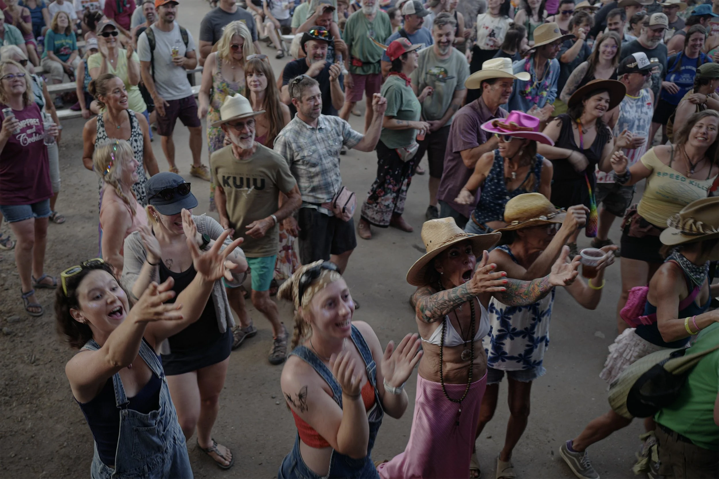 During most band performances, festival visitors kick up their feet and dance along Main Street in front of the stage, day or night.