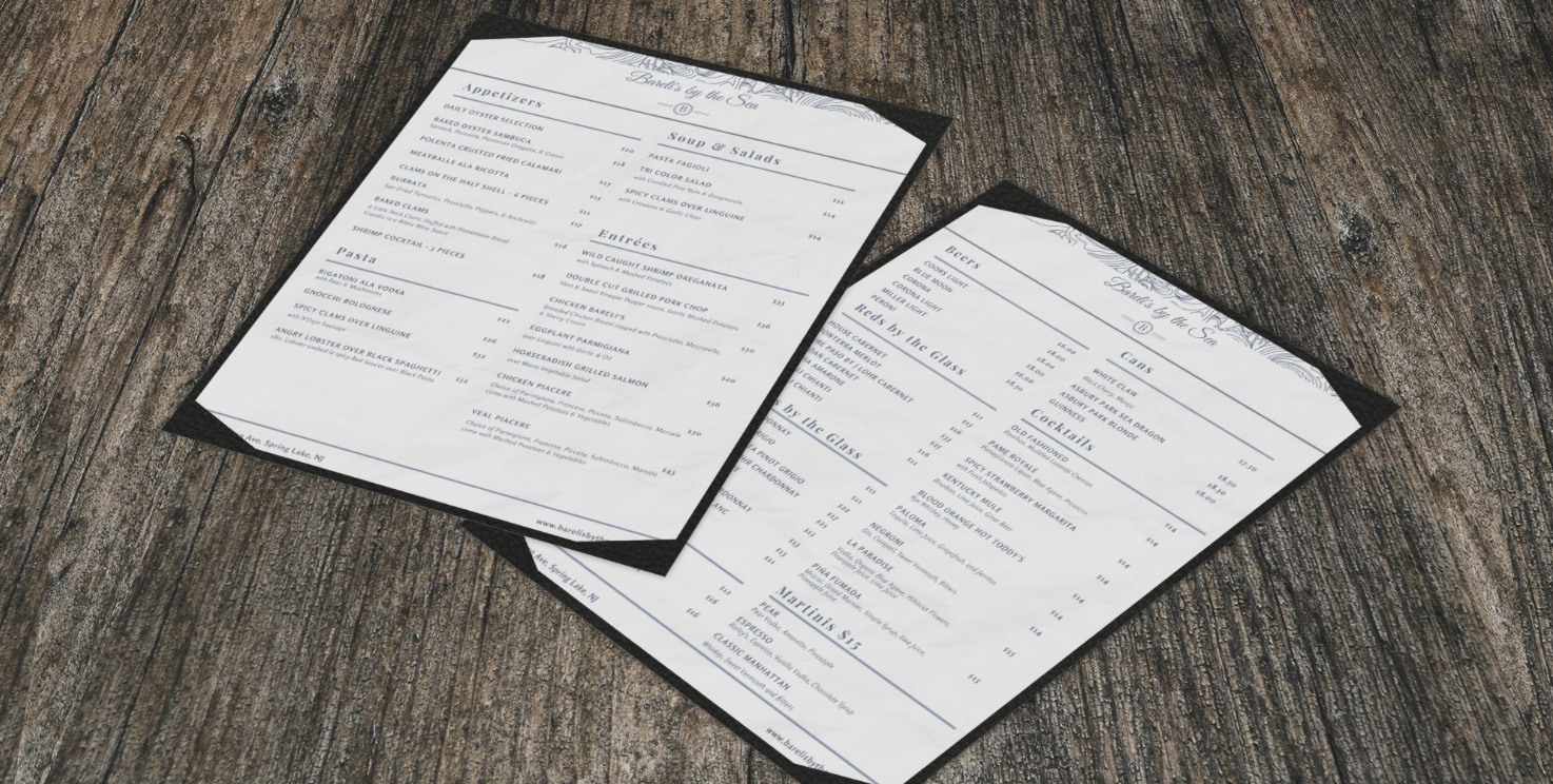 Two menus from a restaurant on a wooden table