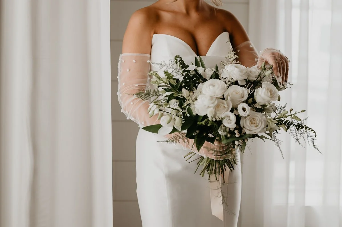 Bridal Bouquet Featuring Unique by Design's Whimsical Floral Arrangements at Crimson Lane Wedding Venue in Ada, Ohio captured by Julia Brown Photo