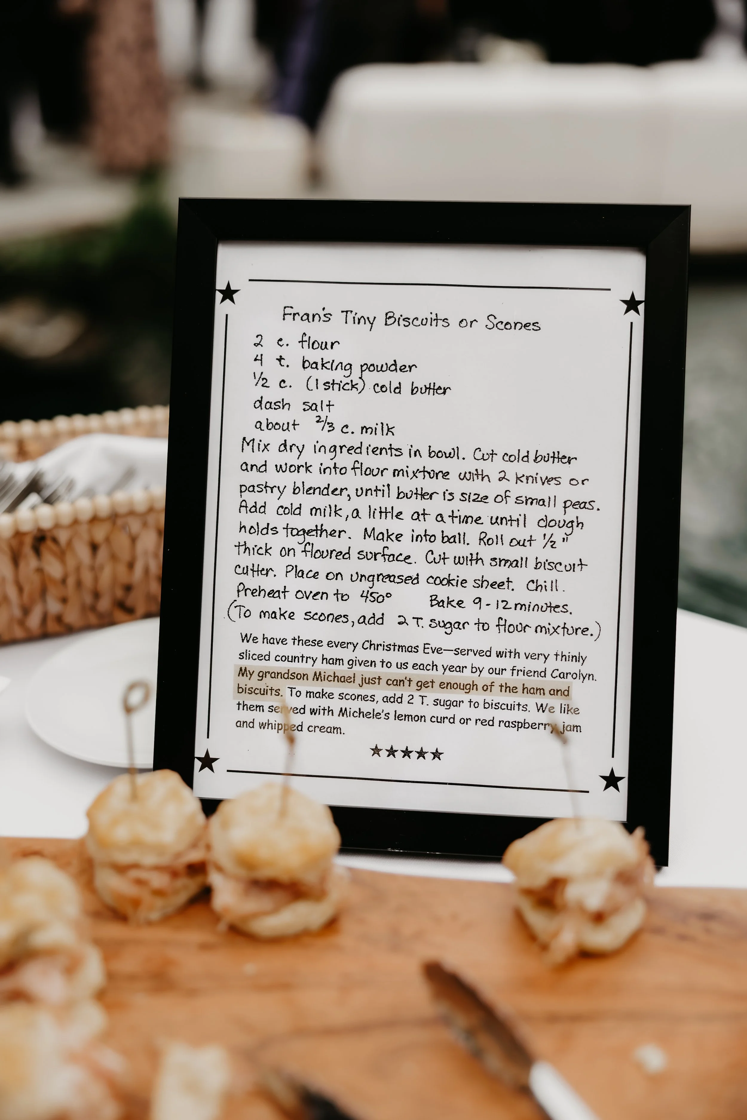 Family biscuit recipe displayed beside passed appetizers during the wedding cocktail hour, photographed by Julia Brown Photo.
