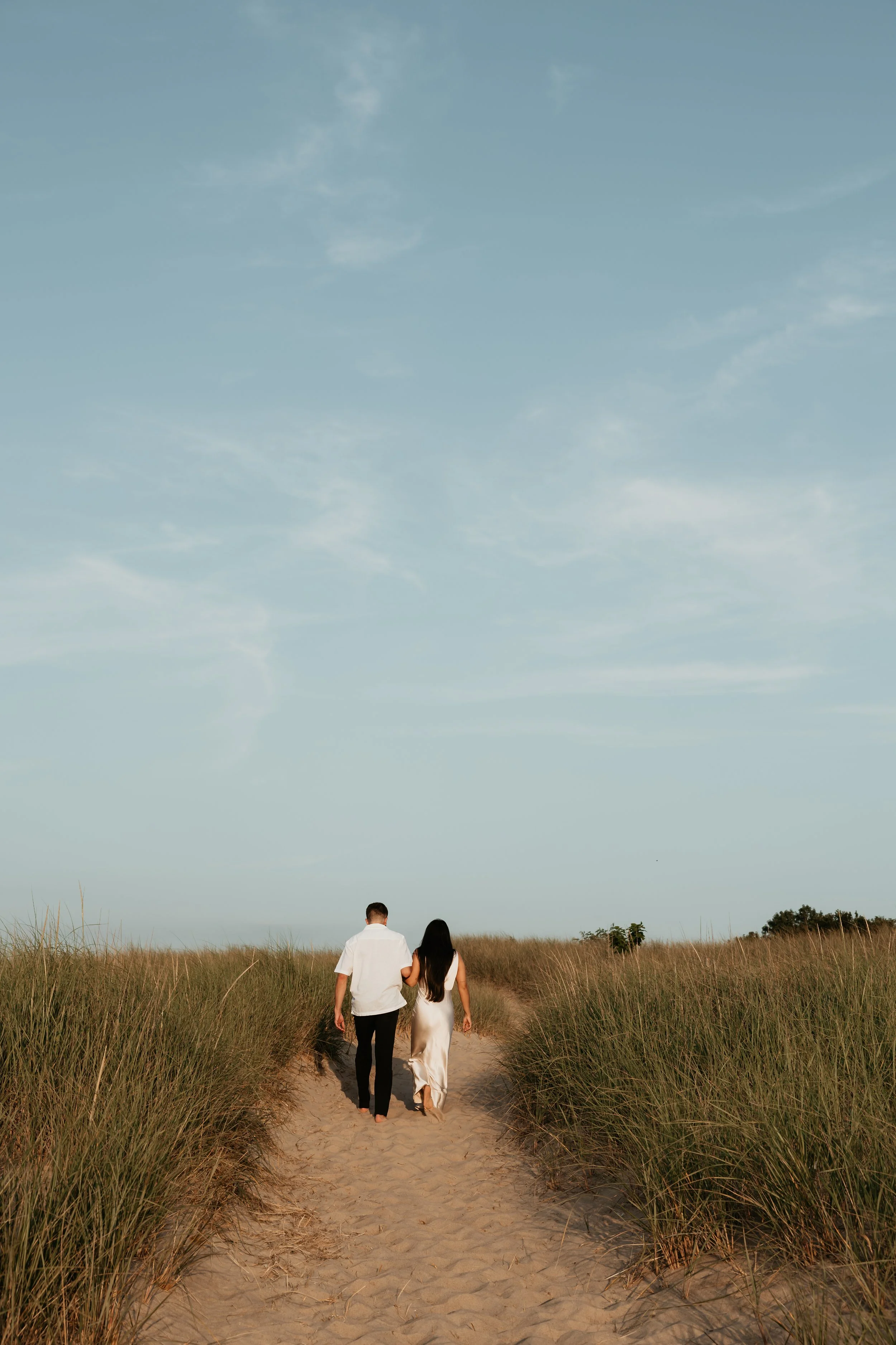 Grand Beach Dune Engagement Photos by Julia Brown Photo