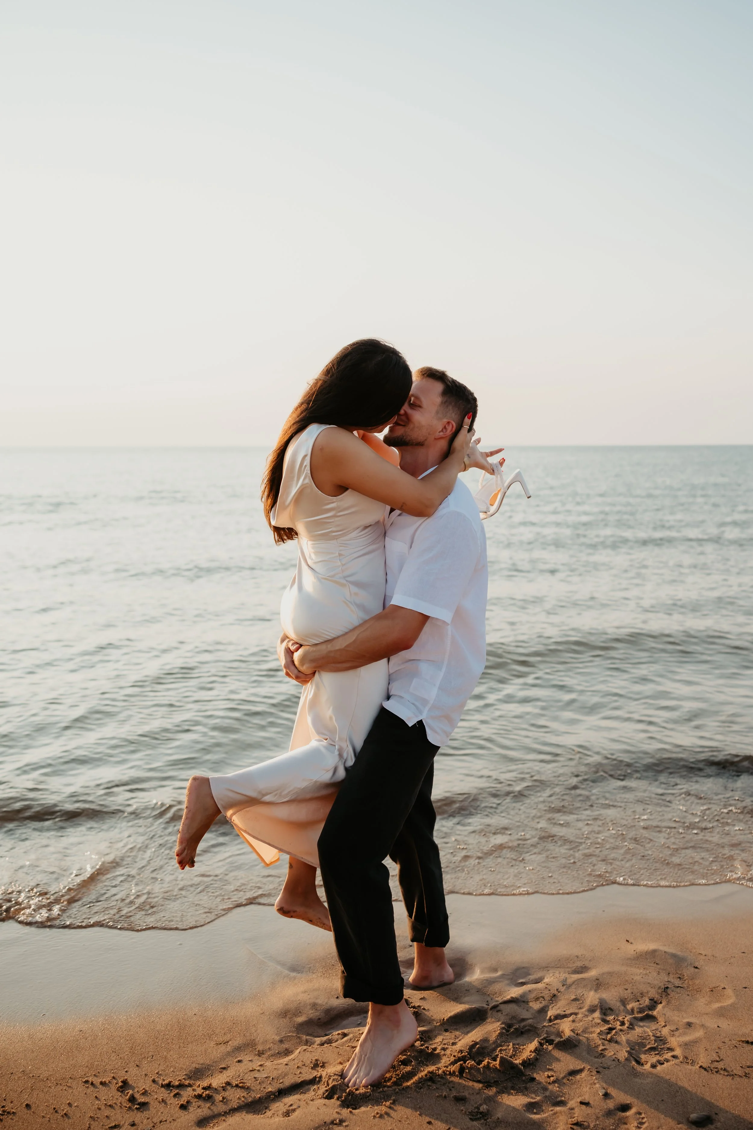 Candid Lake Michigan Engagement Portrait