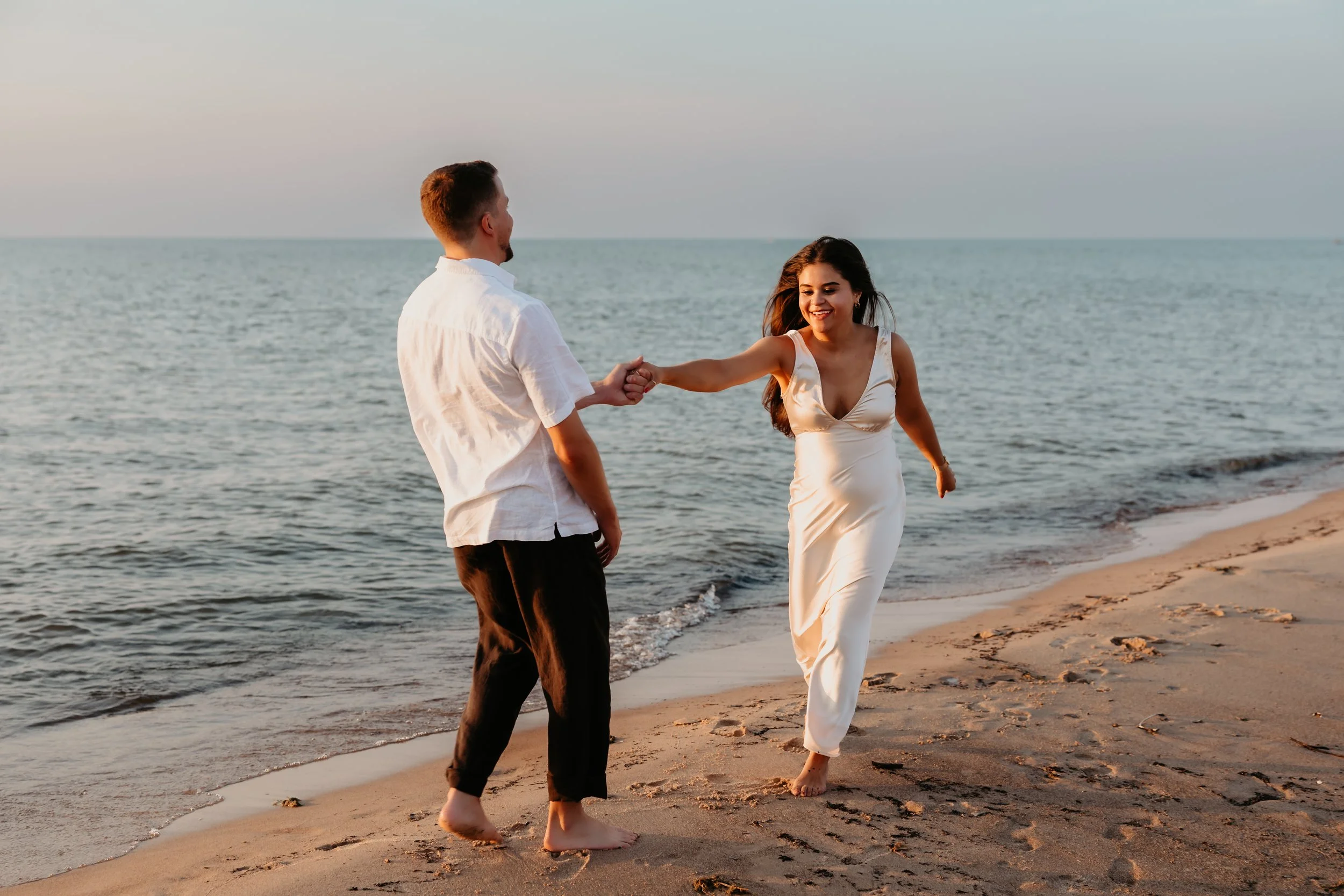 Grand Beach Shoreline Engagement Portrait
